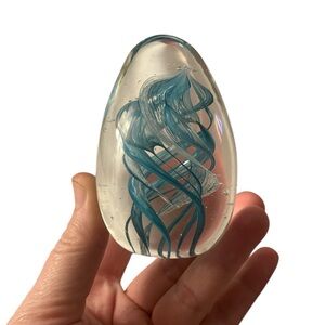 Vintage Art Glass blue & and white satin Swirl Art Glass Egg Shaped Paperweight.